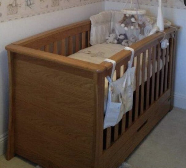 cot bed with changing top